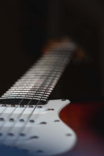 leisure activities white and brown stratocaster electric guitar electric guitar